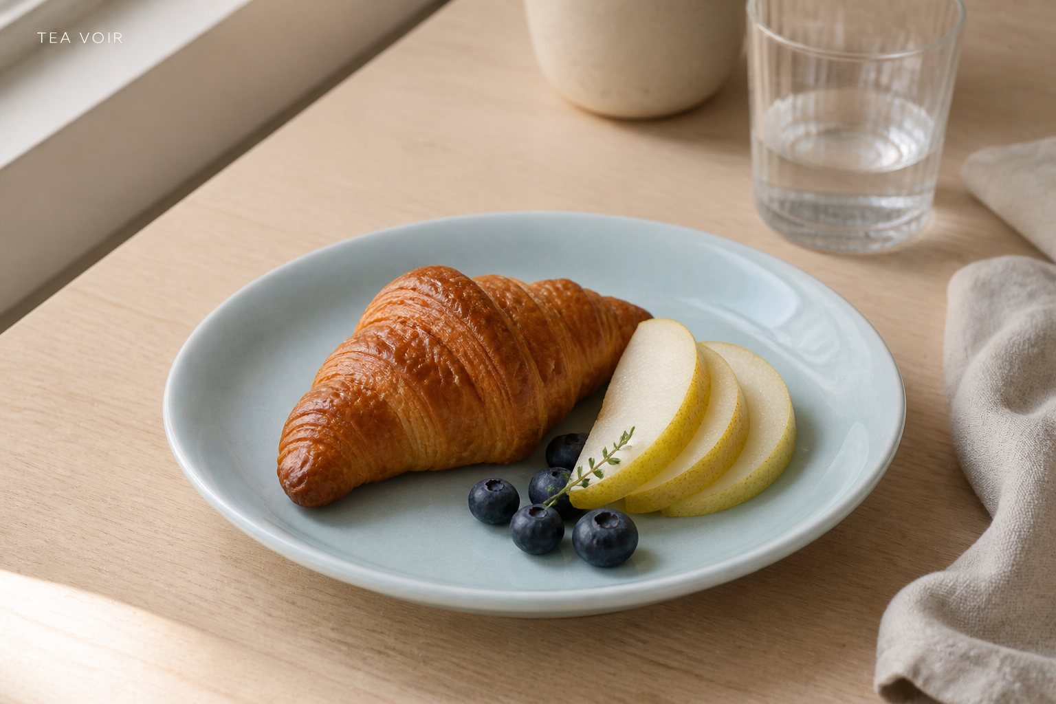 TEAVOIR pale blue ceramic plate used for an everyday breakfast